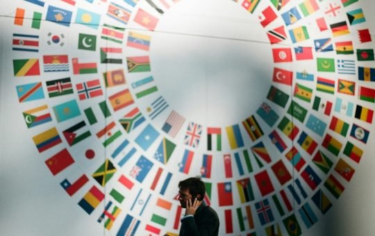 Flags at the World Bank illustrating an article with viewpoints from Boston Consulting Group, or BCG, on how generative AI is reshaping global competition and geopolitics, presenting challenges and opportunities for nations and businesses alike.